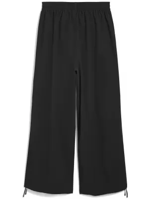 Hose PUMA WARDROBE ESS OVERSIZED PARACHUTE PANTS WV OP 63206801 PUMA SCHWARZ