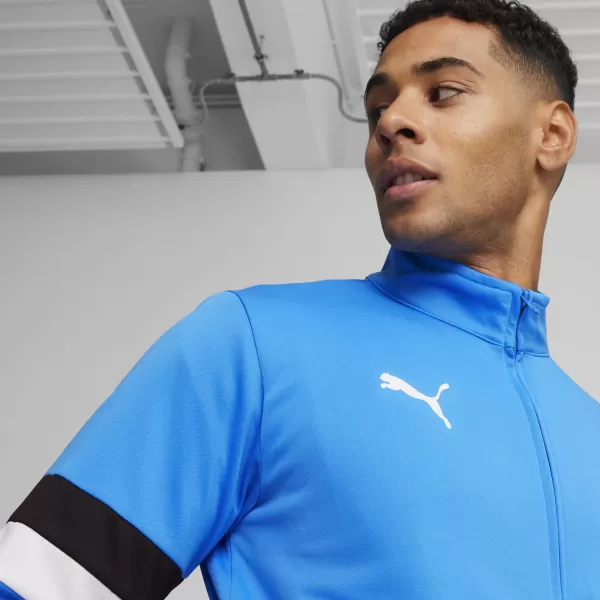 Herren-Trainingsanzug-Set PUMA TEAMRISE TRACKSUIT 658653_02 IGNITE BLUE/ IGNITE BLAU/PUMA SCHWARZ 