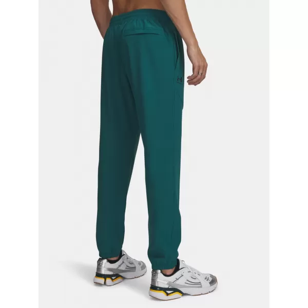  Herren-Jogginghose UNDER ARMOUR VIBE WOVEN JOGGER 1386557-338 GRÜN 